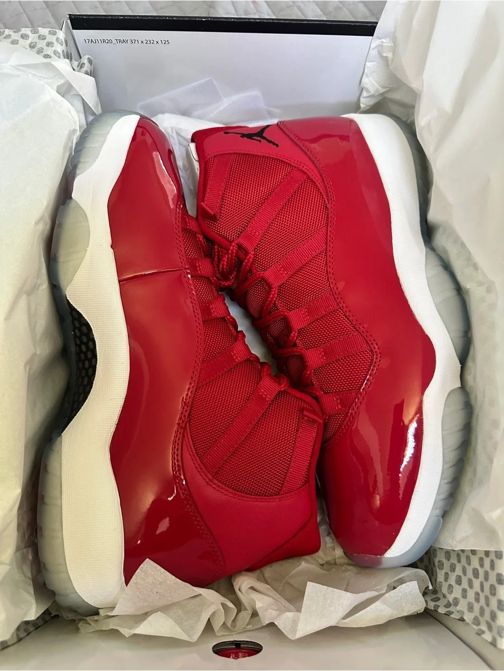 Air Jordan 11 Retro 'Win Like 96' Red Patent Leather Sneakers